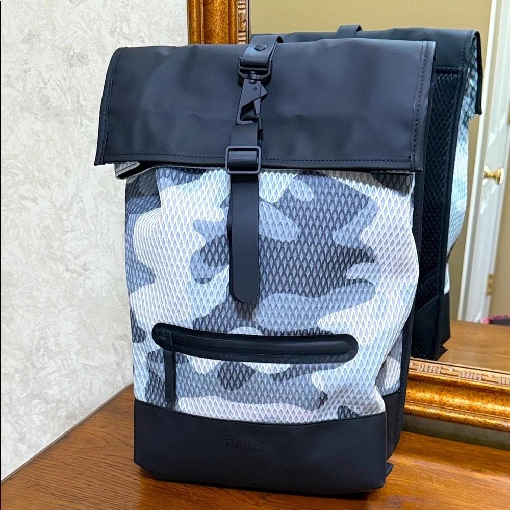 New Rains Black and Gray Unisex camo look Backpack.